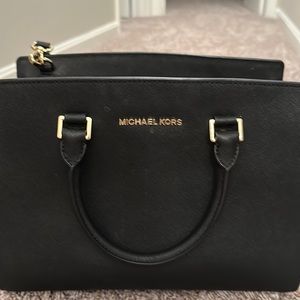 Michael Kors dark navy blue bag with detachable strap. No odors,  clean inside.